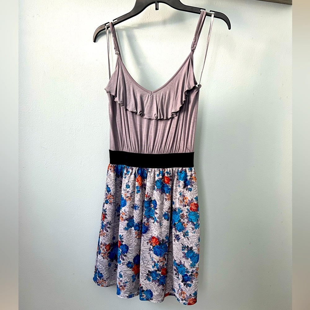 Wet Seal brand dress featuring a gray ruffled top and a floral print skirt. Med.